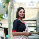black khadi blouse with red frill and piping