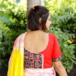 red khadi body with ajrak sleeves and neck design blouse