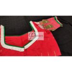 red jamdani body with white green work with 3layer frill blous3e