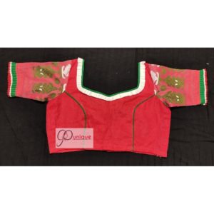 red jamdani body with white green work with 3layer frill blouse
