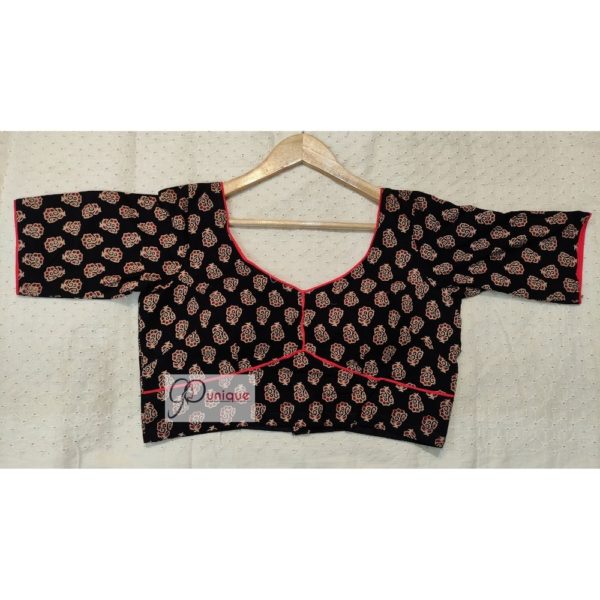 black ajrak with red piping blouse