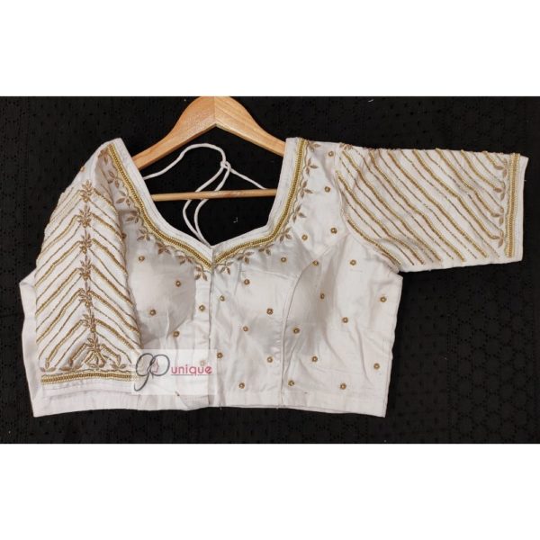 white body golden beads with white pearl maggam work blouse4