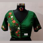 green hand embroidery (aari work) glass sleeves blouse design