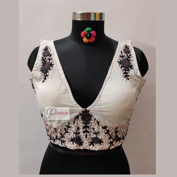 white hand embroidery (aari work) sleeveless blouse design