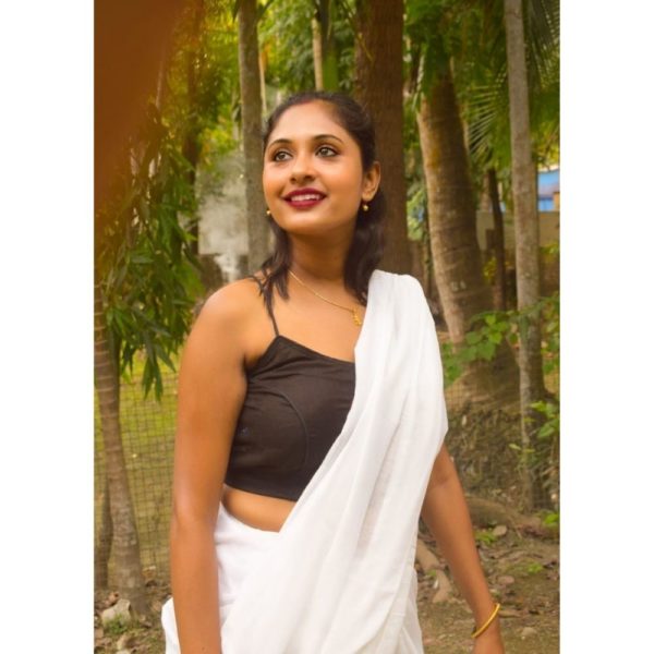 black khadi with multi fabric latkan sleeveless blouse