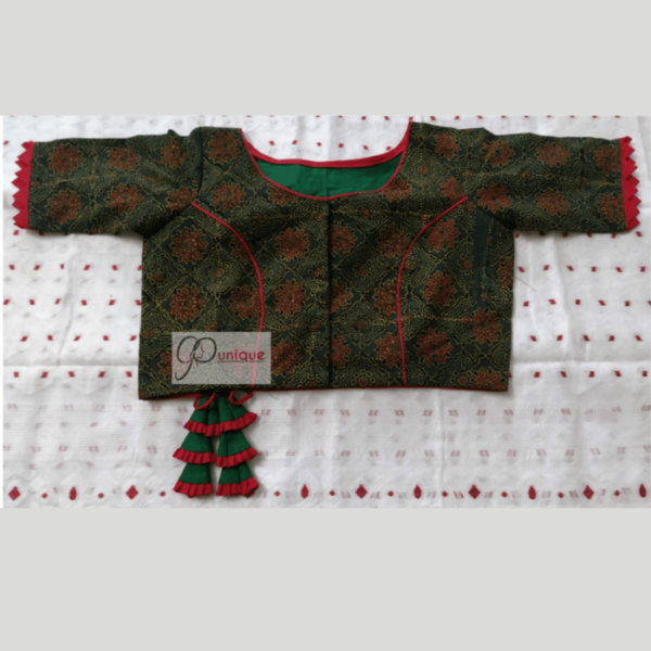 Green Ajrak Blouse With Red Piping And Frill