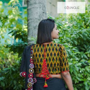 red ikkat with black yellow work and latkan blouse
