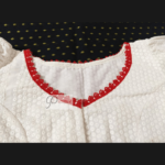 White Chikan Puff Sleeves Blouse With Red Crouse Work In Neck And Sleeves 2