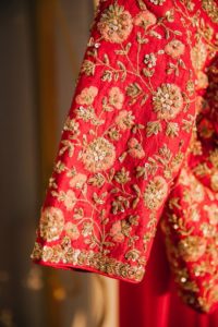 red zari work embroidered blouse sleeves