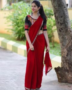 plain red mirror work heavy embroidered blouse design