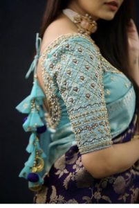 blue aari work blouse design with handmade embroidery