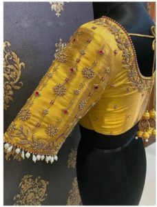 golden saree work design with handmade work