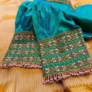heavy stonework handmade aari saree blouse design