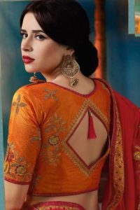 orange aari work blouse design