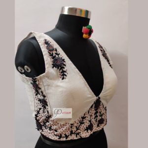 white hand embroidery (aari work) sleeveless blouse design1